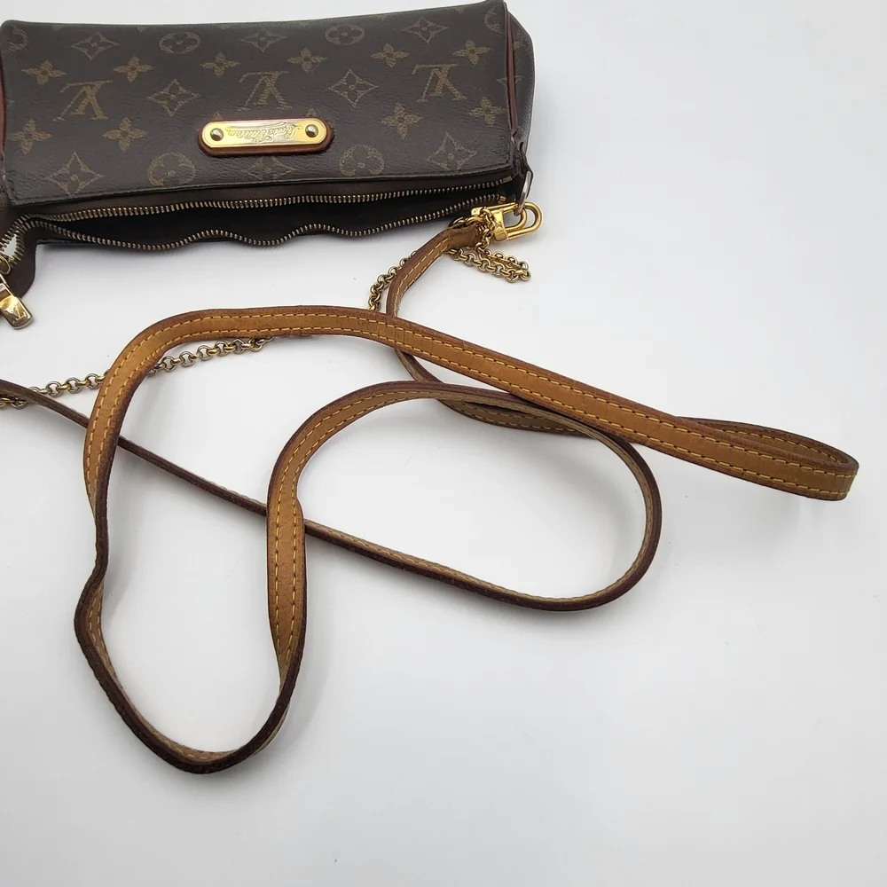 LOUIS VUITTON Eva Monogram Leather Pochette Bag..Authentic..